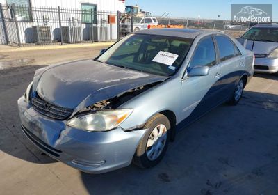2003 Toyota Camry Le 4T1BE32K33U679779 photo 1